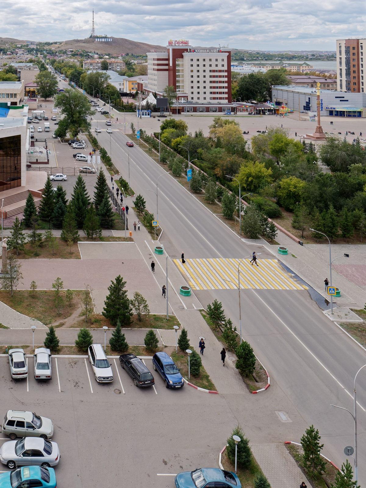 город